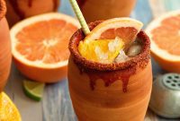 Fiesta in a Clay Cup: Jarritos, Tequila, and Vibrant Citrus