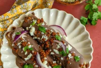 Creamy Black Bean Enfrijoladas with Crumbled Queso Fresco