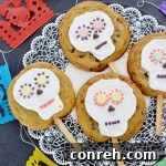 Vibrant and fun Sugar Skull Cookie Pops decorated for Dia de los Muertos and Halloween