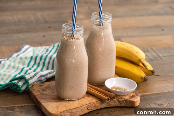 Cinnamon Pecan Grain Elixir 3 Close-up of a glass of Cinnamon Pecan and Cereal Smoothie with amaranth topping, ready to be enjoyed
