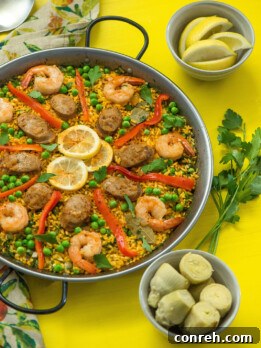Delicious Chicken Sausage and Shrimp Paella, a perfect dish for summer gatherings.