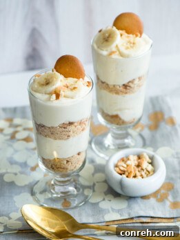 Golden Banana Dream Parfait 2 Beautifully layered Banana Cream Parfaits in glass cups, ready to be served