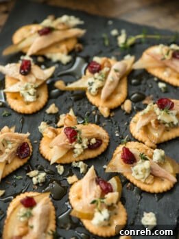 Pear Blue Cheese Crackers with Honey on a serving tray