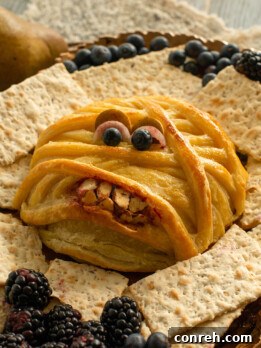Halloween Baked Brie Mummy