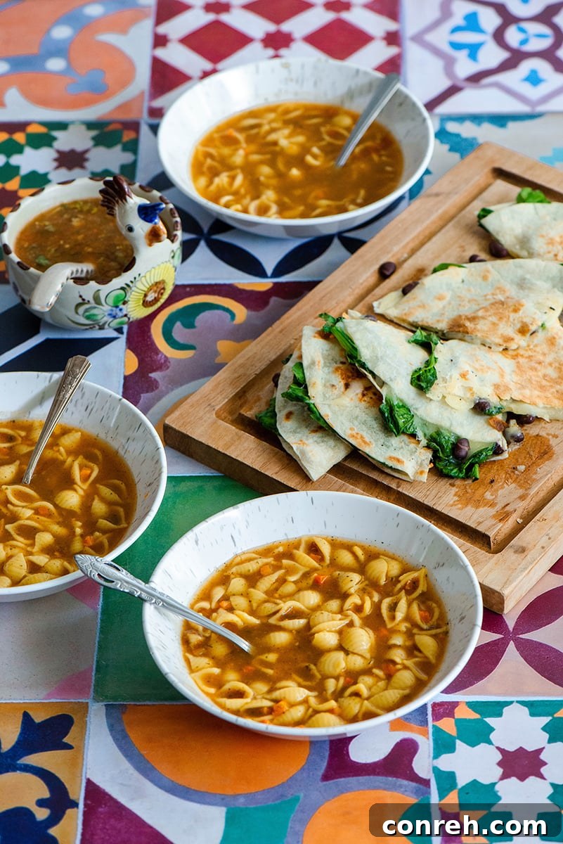 Close-up of a bowl of Knorr Sopa Mexicana Minestrone with a spoon.