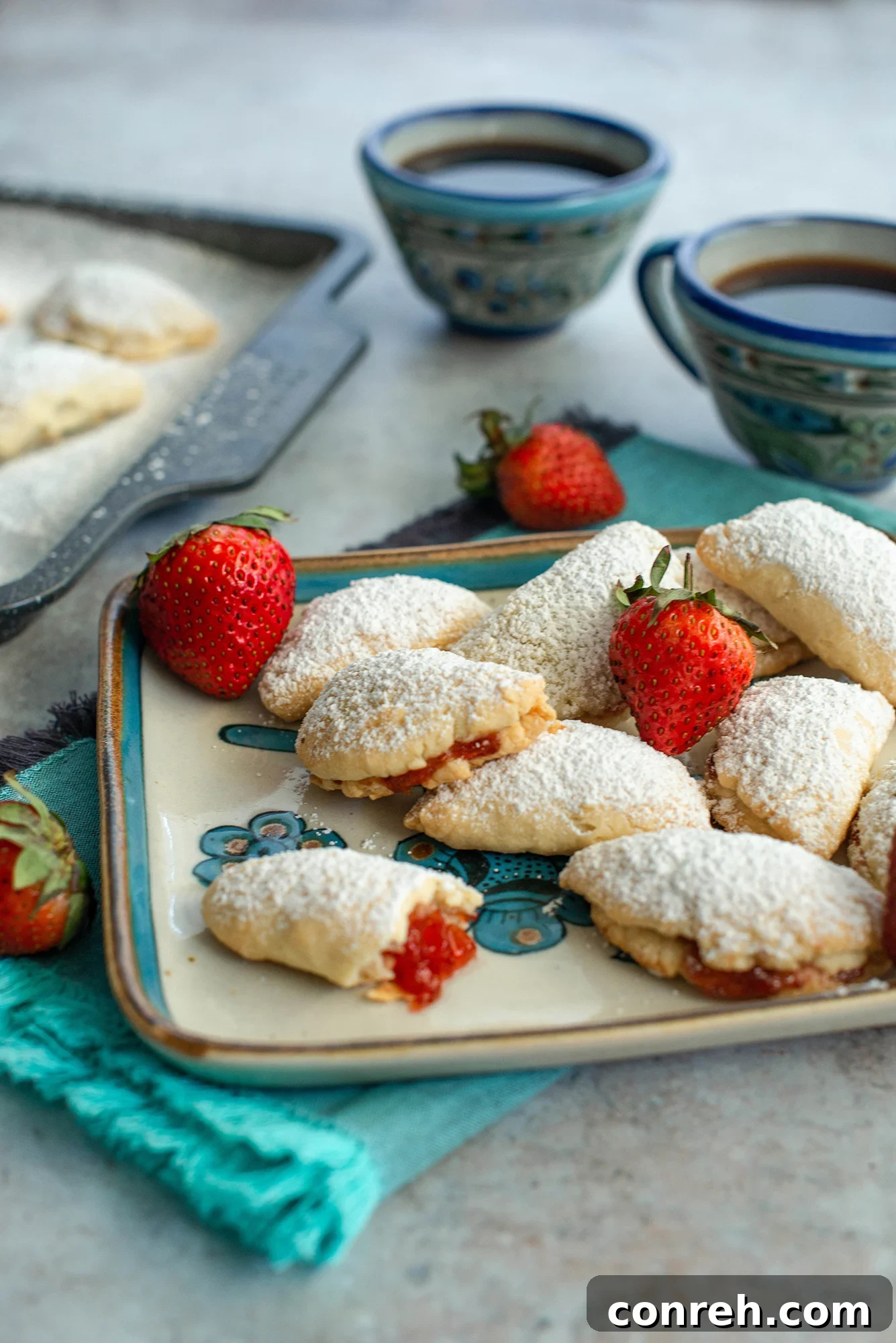 Freshly baked Mini Empanaditas, Lunitas de Fresa, on a cooling rack.
