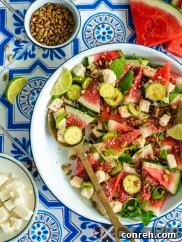 Individual serving of Watermelon Cucumber Salad with Queso Fresco and Cotija