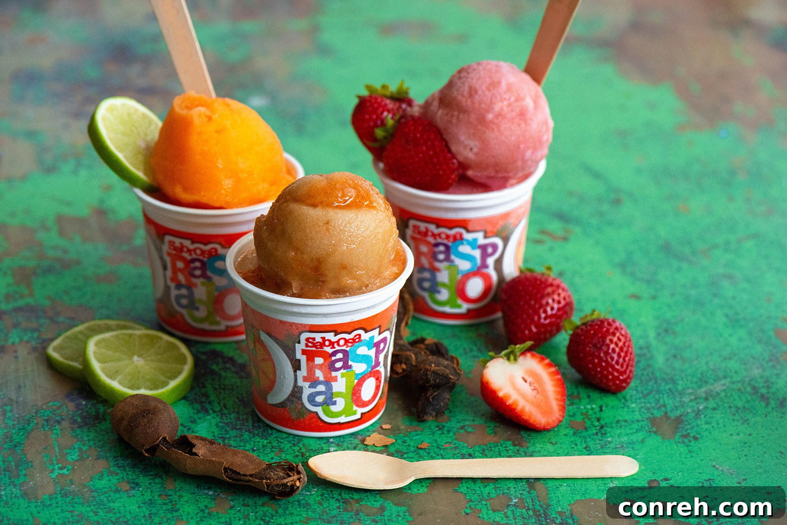 Flavorful Shaved Ice 3 Assortment of Sabrosa Raspado flavors, including Fresas Con Crema, Tamarind Chamoy, and Mango Chamoy.