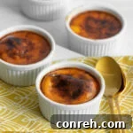 A delicious Jericalla dessert served in a small ramekin, showing its creamy texture and golden brown top.