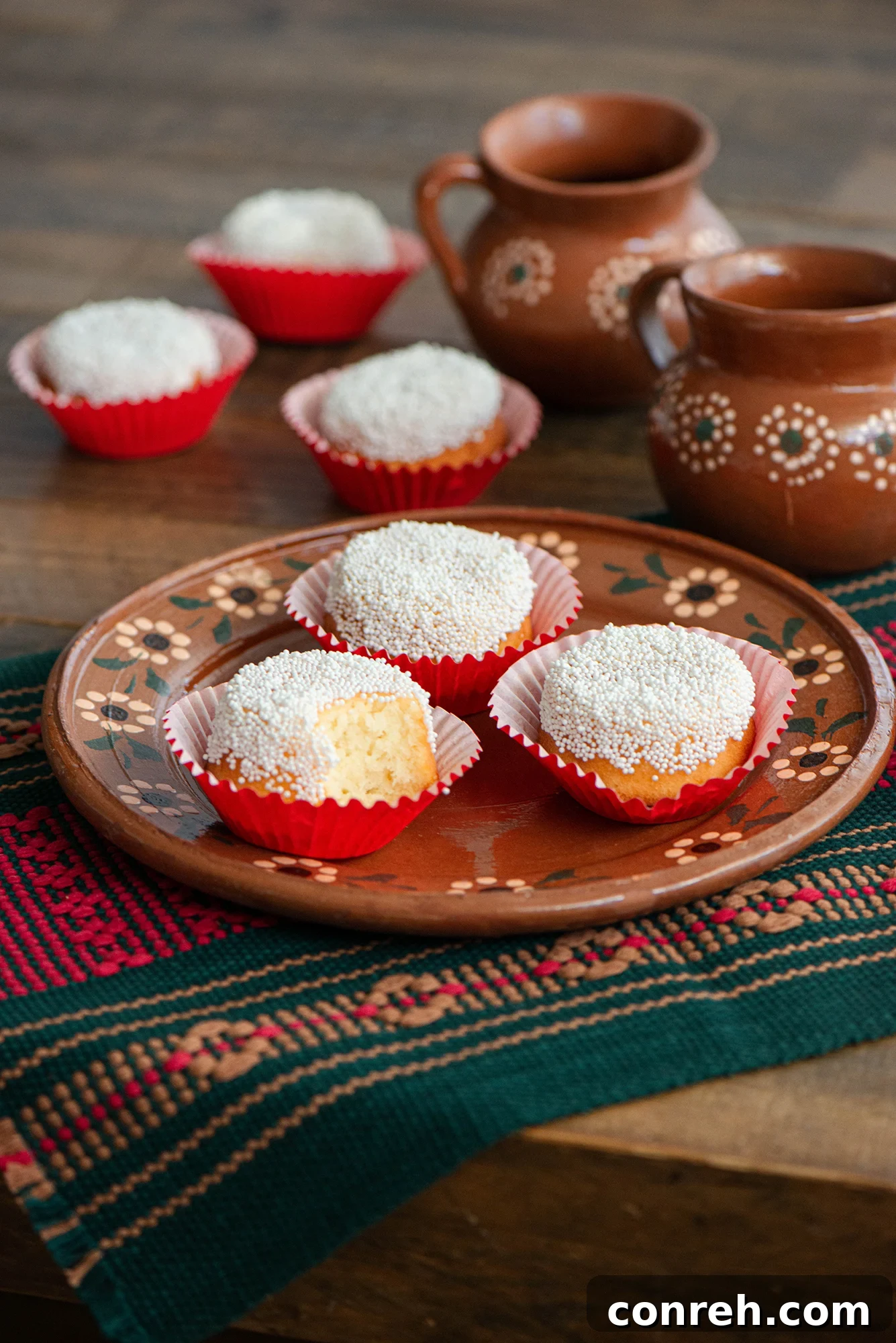 Delicious Garibaldis, a classic Mexican poundcake, topped with apricot glaze and white sprinkles.