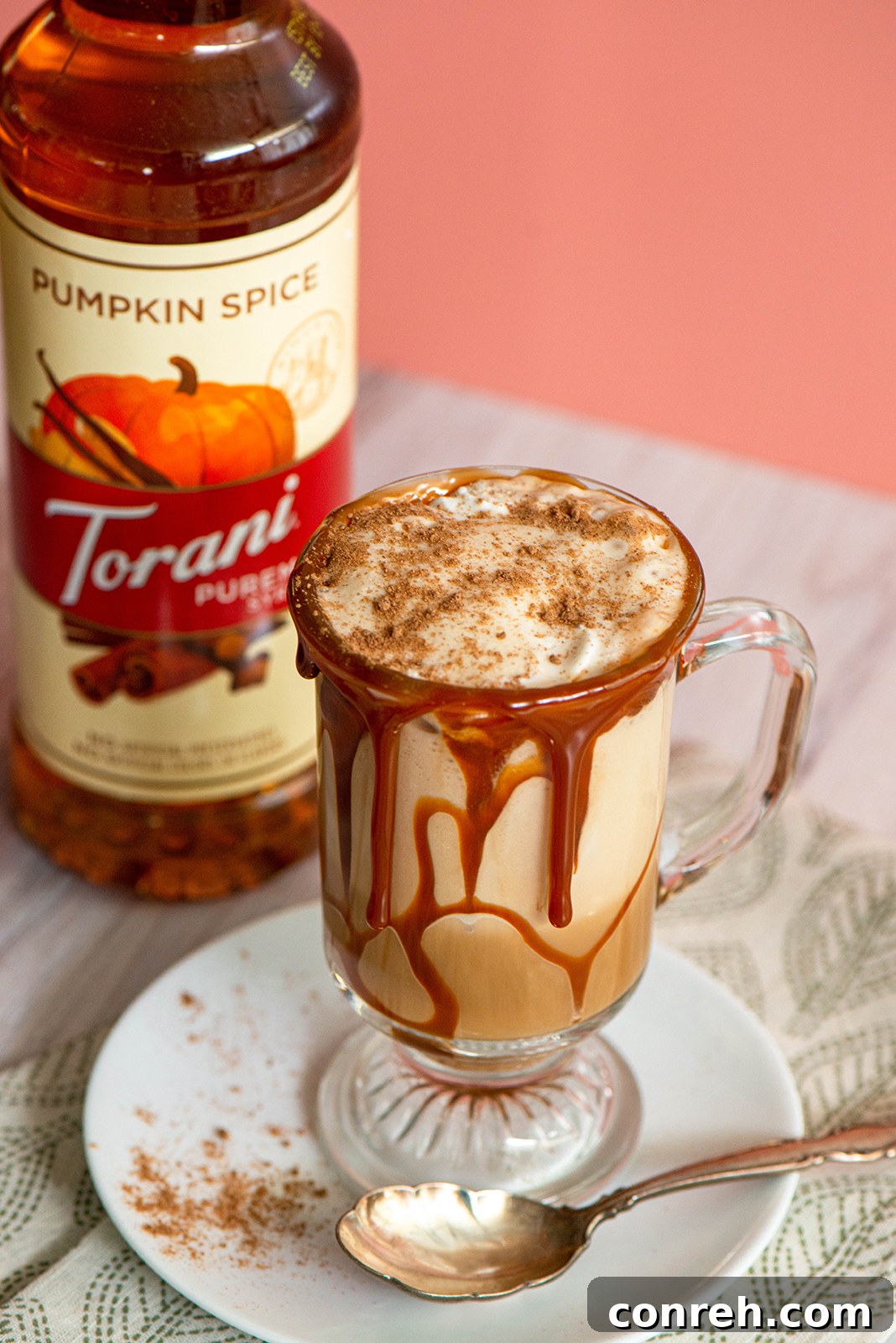 Delicious Pumpkin Spice Cajeta Frappe in a glass, ready to be enjoyed.