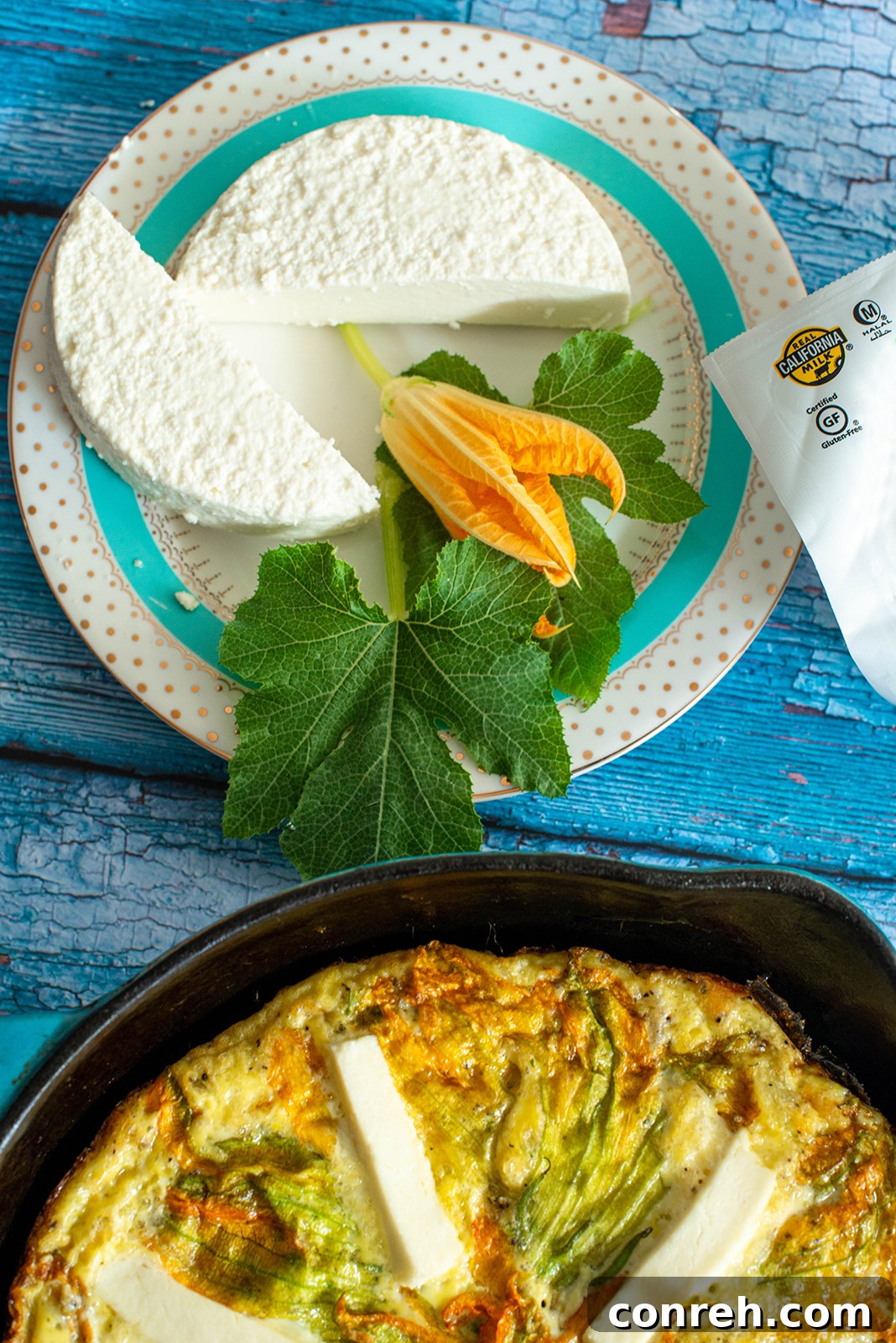 A slice of the frittata being served, showing the fluffy interior and melted cheese.