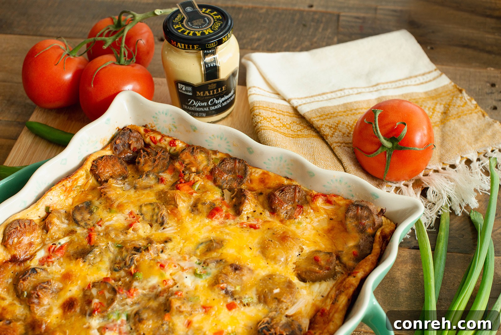 Close-up of the casserole ingredients layered in a baking dish before cooking