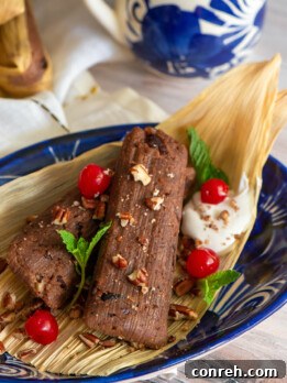 Delicious Chocolate Cherry Tamales with Pecans, a sweet twist on a traditional favorite.