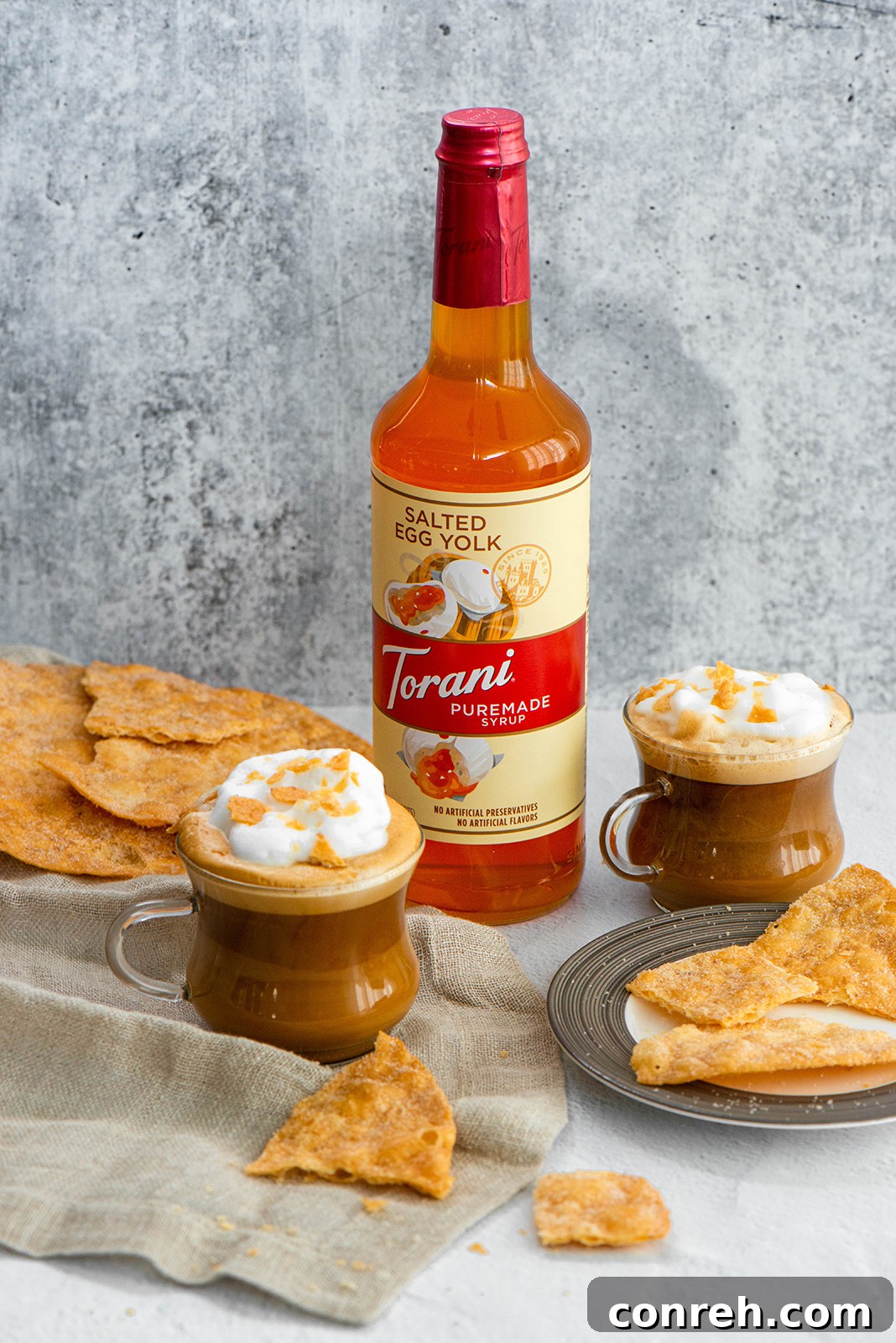 Another enticing view of the Salted Egg Yolk Latte, showcasing its rich color and inviting foam, perfect for a cozy morning.