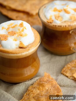 Delicious Salted Egg Yolk Latte garnished with buñuelo crumbles