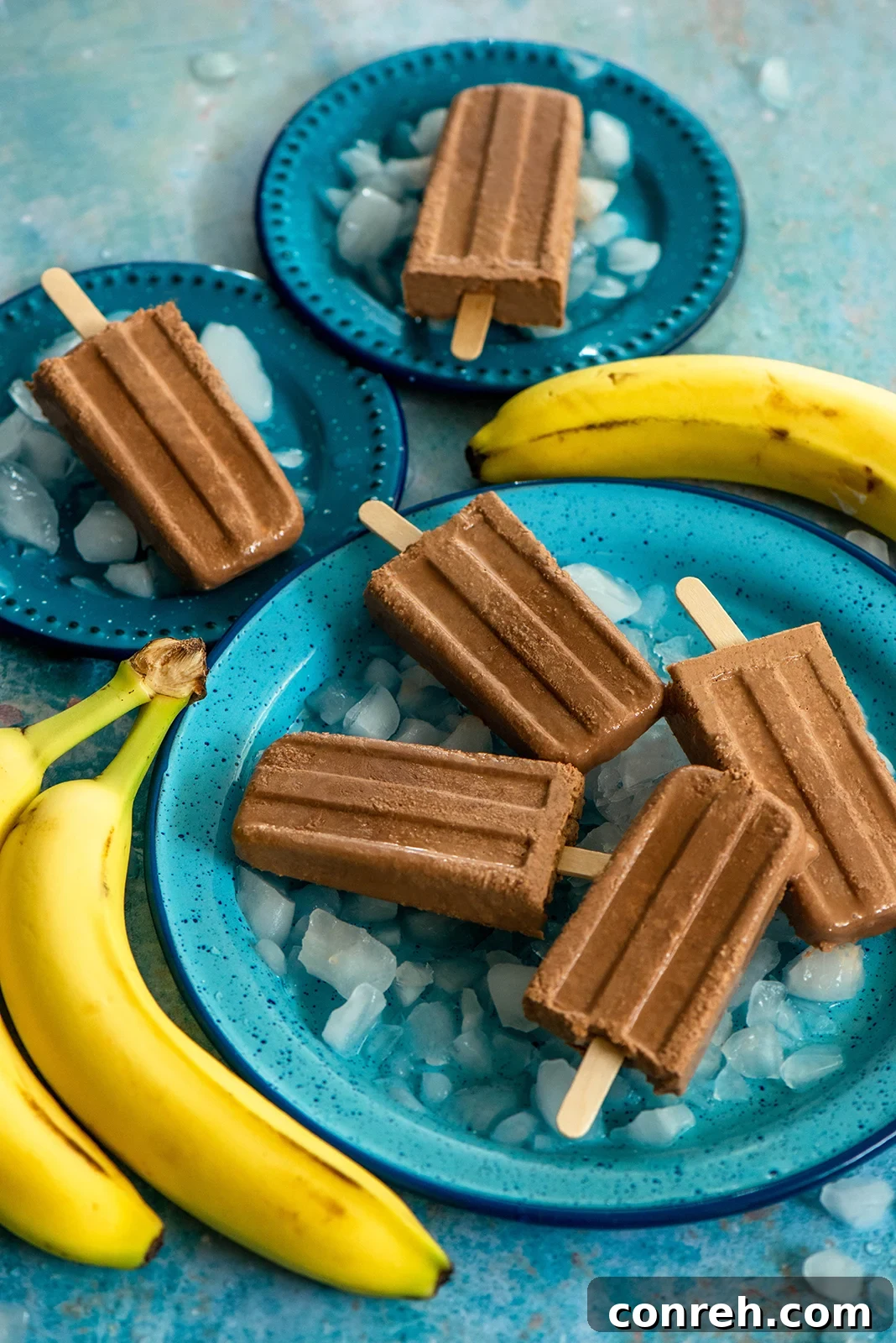 Delicious Homemade Banana Chocolate Popsicles, a perfect creamy frozen dessert for summer