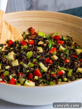 Wild Rice Salad with Apples and Prunes in a serving bowl