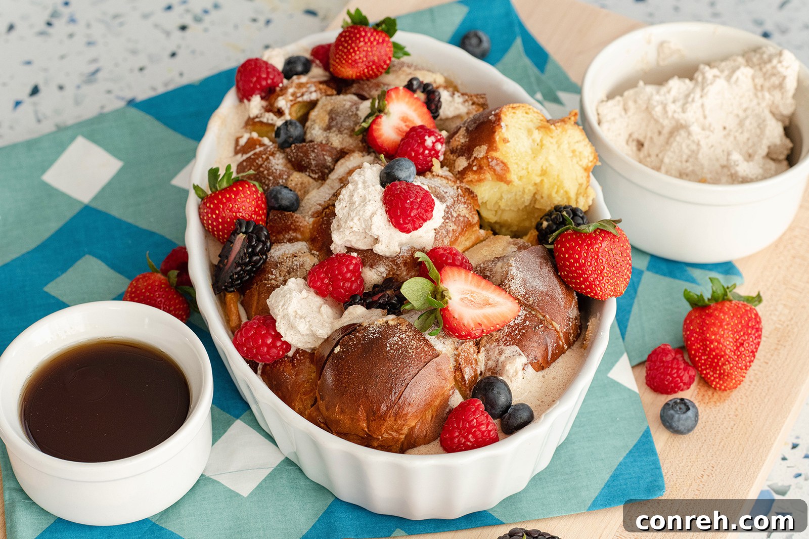 Close-up of golden brown baked Pull Apart French Toast, glistening with melted butter, ready for toppings and serving.