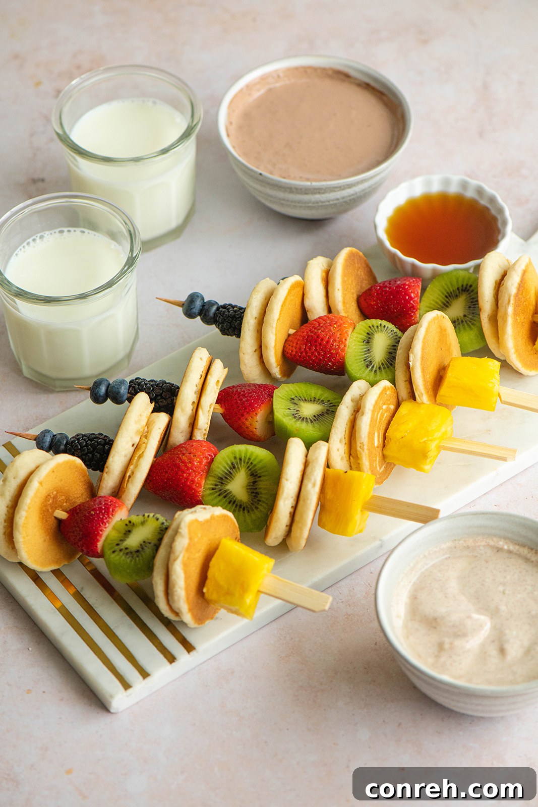 Colorful Pancake Fruit Skewers with a glass of Real California Milk
