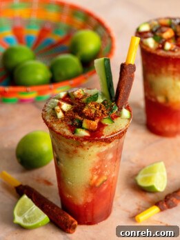 A refreshing Pepinada, a Mexican cucumber slushie, ready to be served in a tall glass.