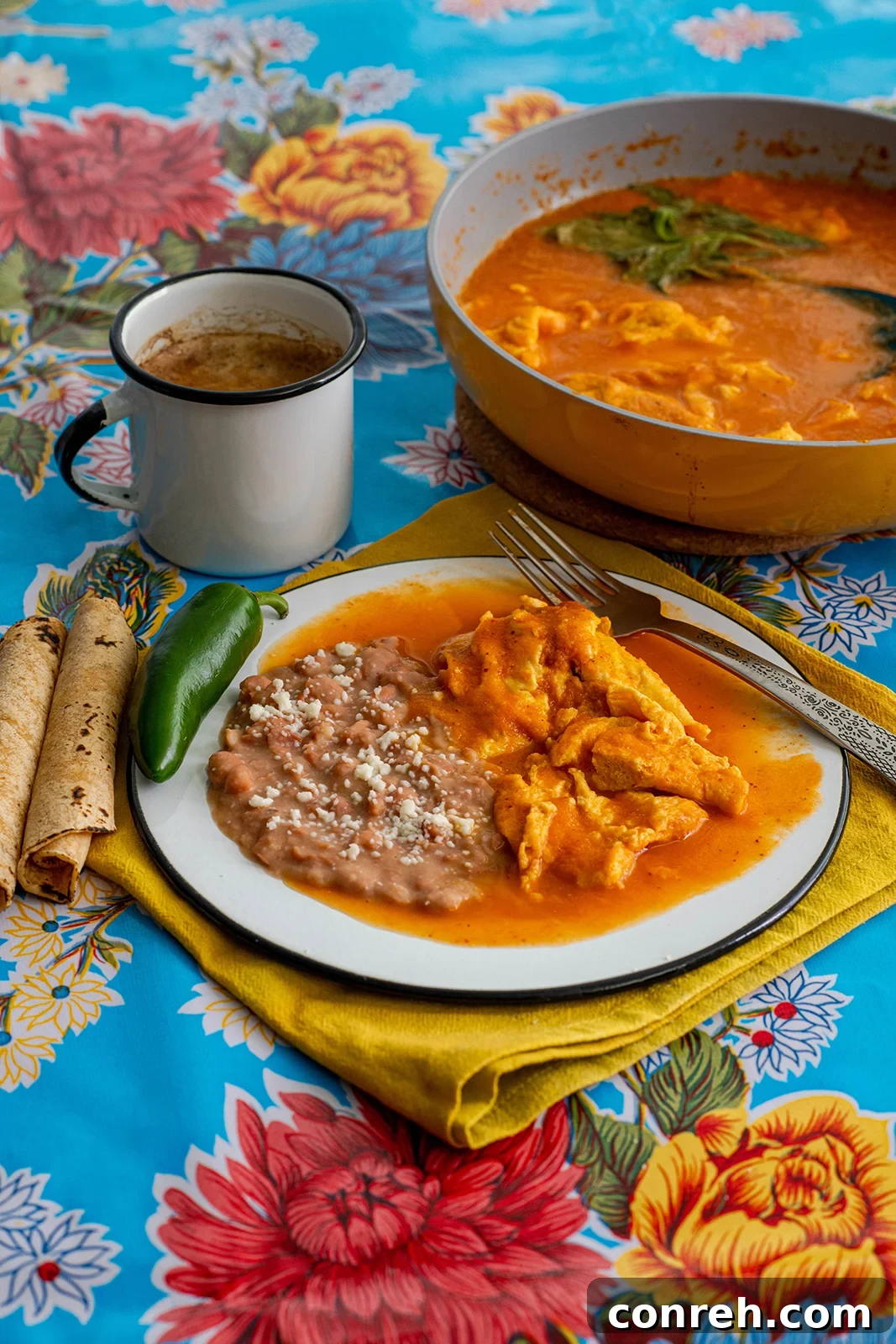 Tomato-Simmered Egg Fritters 2 Delicious Torta de Huevo en Caldillo being prepared with fresh ingredients