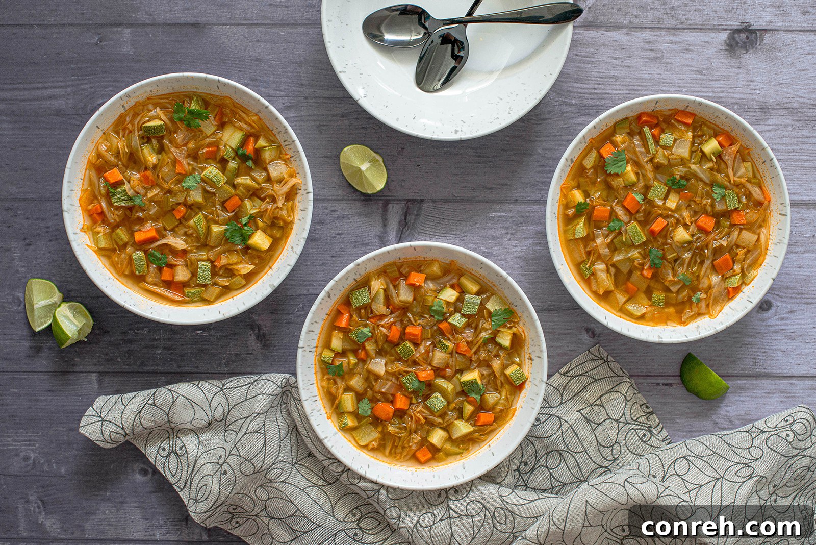 A close-up of Detox Cabbage Soup simmering in a pot, showcasing its fresh vegetables and rich broth.