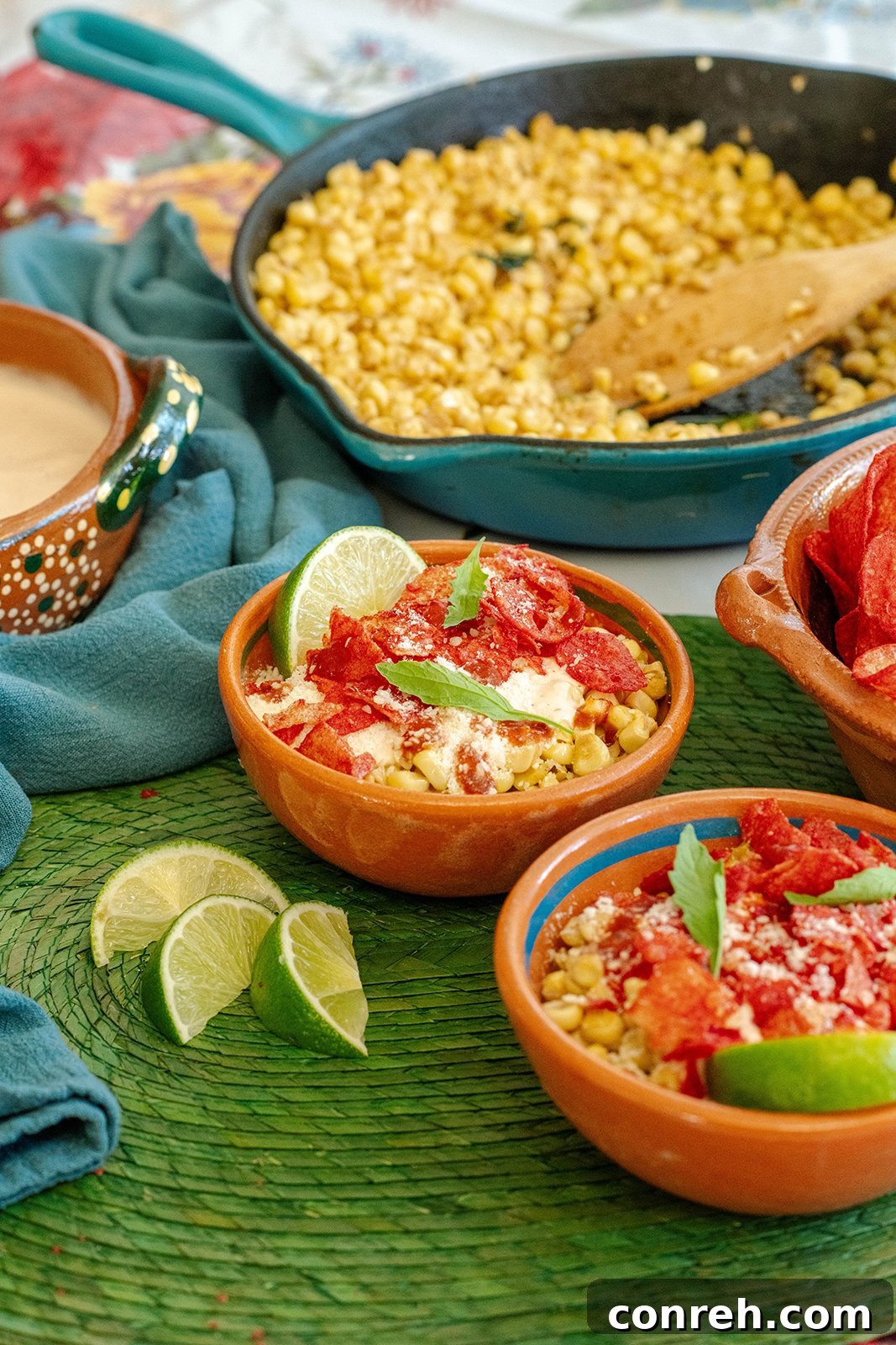 Close-up of Esquites Fuego with vibrant corn kernels and creamy sauce