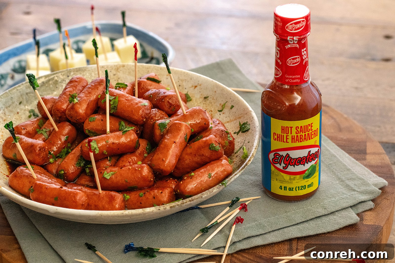Large platter of Salchichas Botaneras with cheese and crackers
