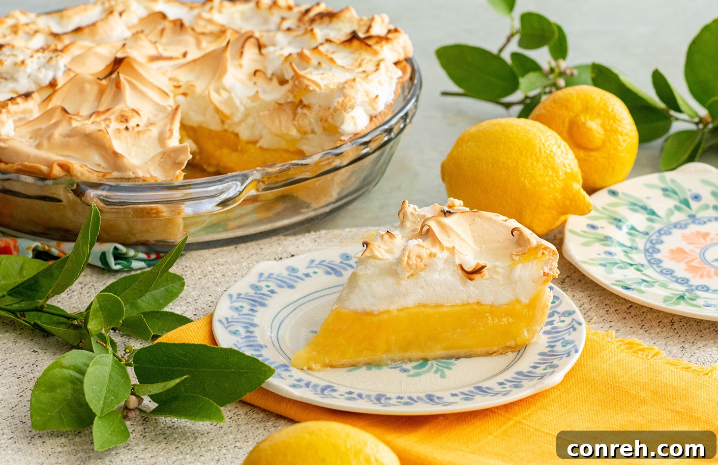 Perfect Homemade Lemon Meringue Pie 3 Close-up of a slice of Lemon Meringue Pie showing its layers