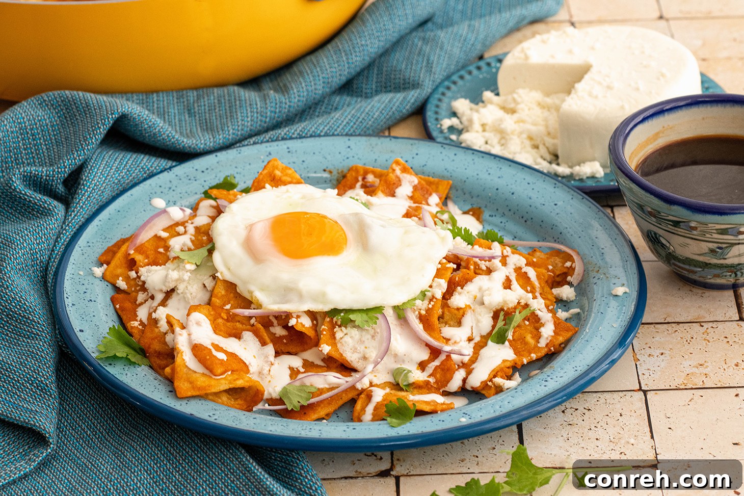 Close-up of Chile Morita Chilaquiles with toppings