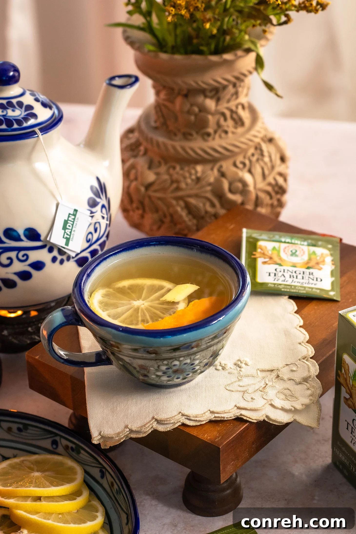 Homemade Piloncillo Syrup A close-up of a rustic wooden spoon scooping out rich piloncillo syrup from a jar, with whole spices visible.