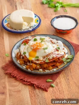 Stacked Potato and Chorizo Enchiladas with fried egg