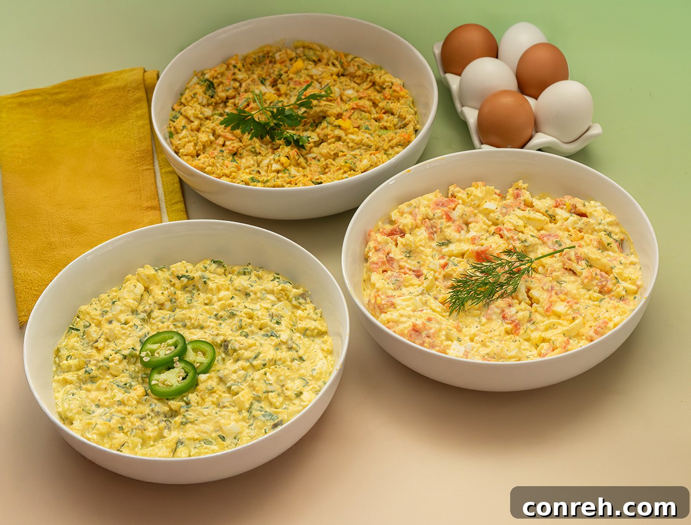 Several baked bread cups in a muffin tin, ready to be filled.