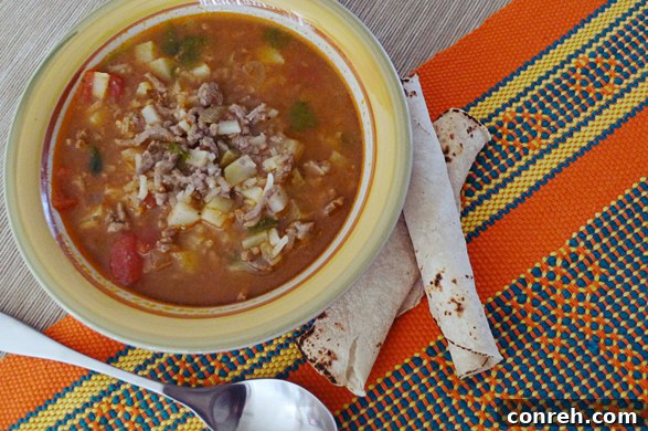 Perfectly Cooked Picadillo A finished bowl of Picadillo, ready to be served, showcasing its vibrant colors and comforting appeal.