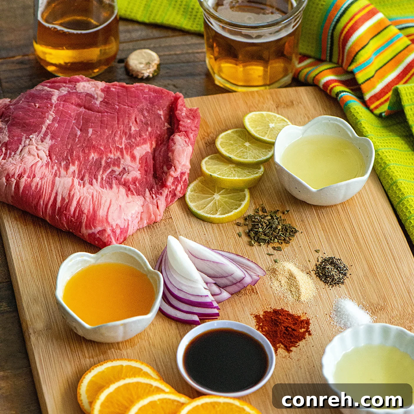 Carne Asada slices on a platter with grilled onions