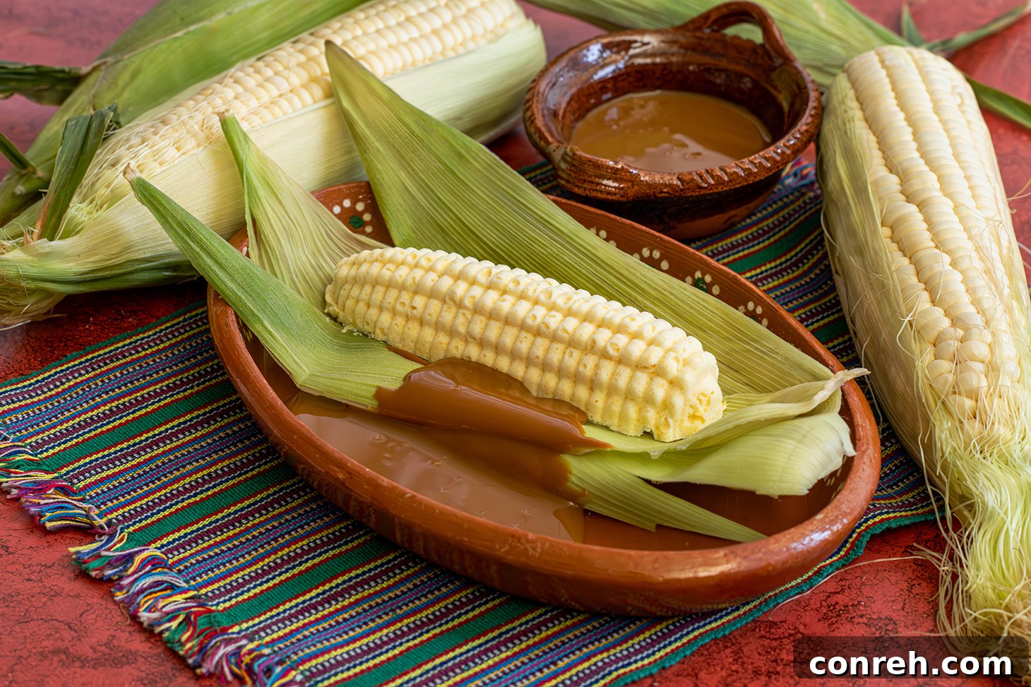 Corn Ice Cream served in a bowl with a spoon, showing its creamy texture