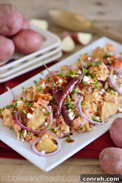 Spicy Red Chipotle Potato Salad, a smoky and creamy side dish with a kick.