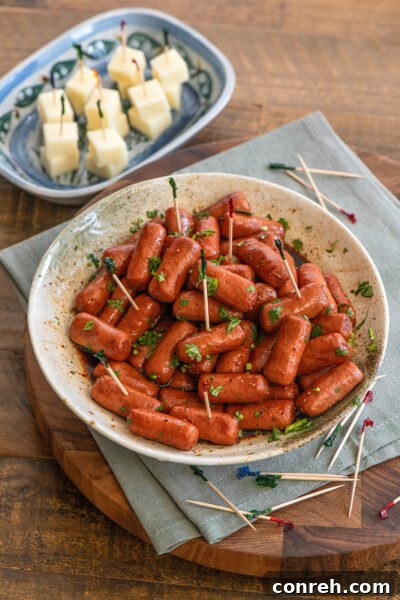 Salchichas Botaneras, a spicy and savory sausage appetizer, perfect for parties.