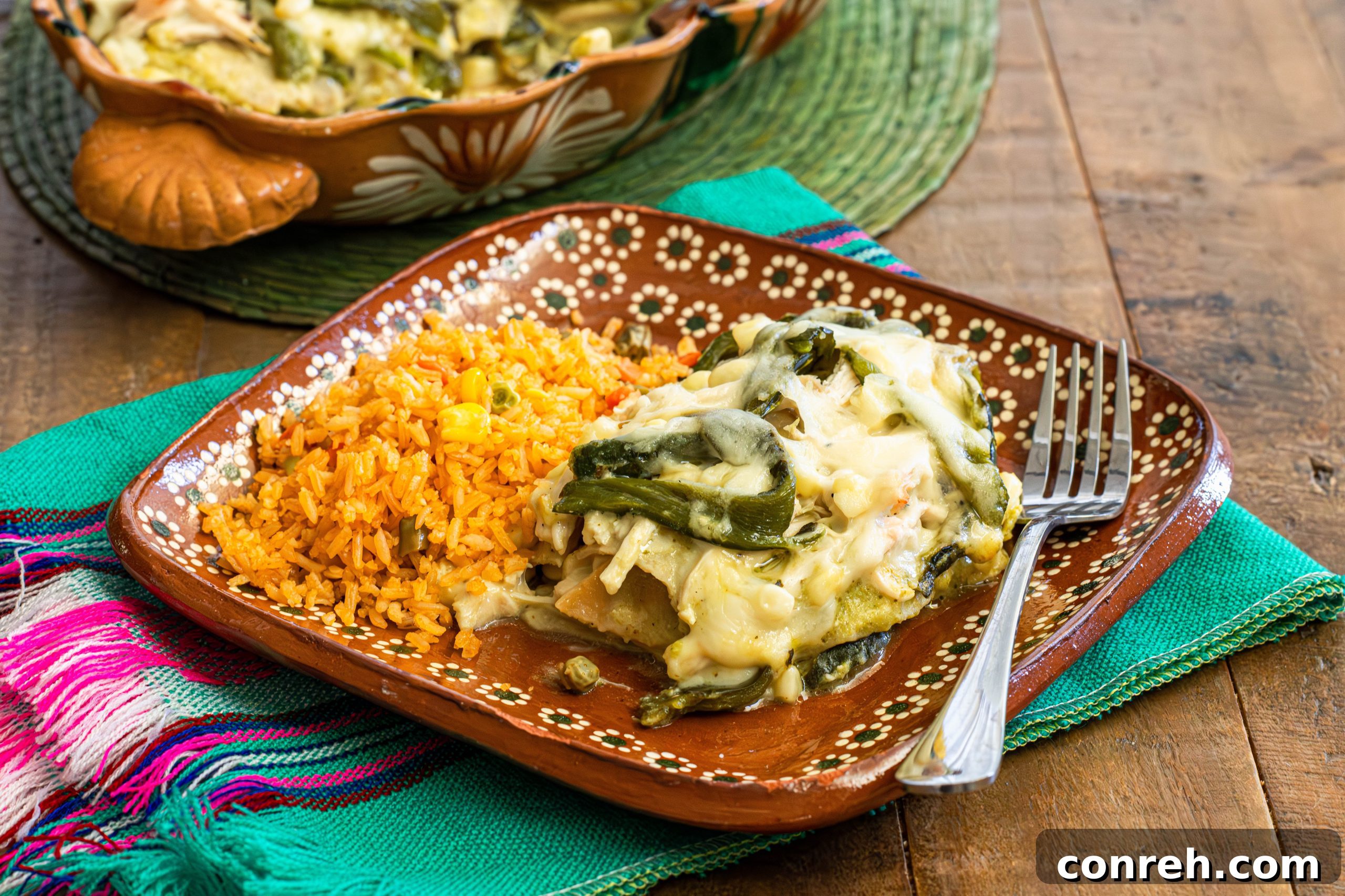 Close-up of a vibrant, green salsa verde with serrano chiles and tomatillos, essential for Pastel Azteca.