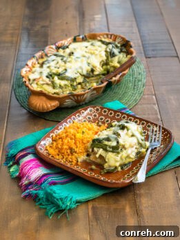 A delicious slice of Pastel Azteca, showing layers of tortillas, chicken, and cheese.