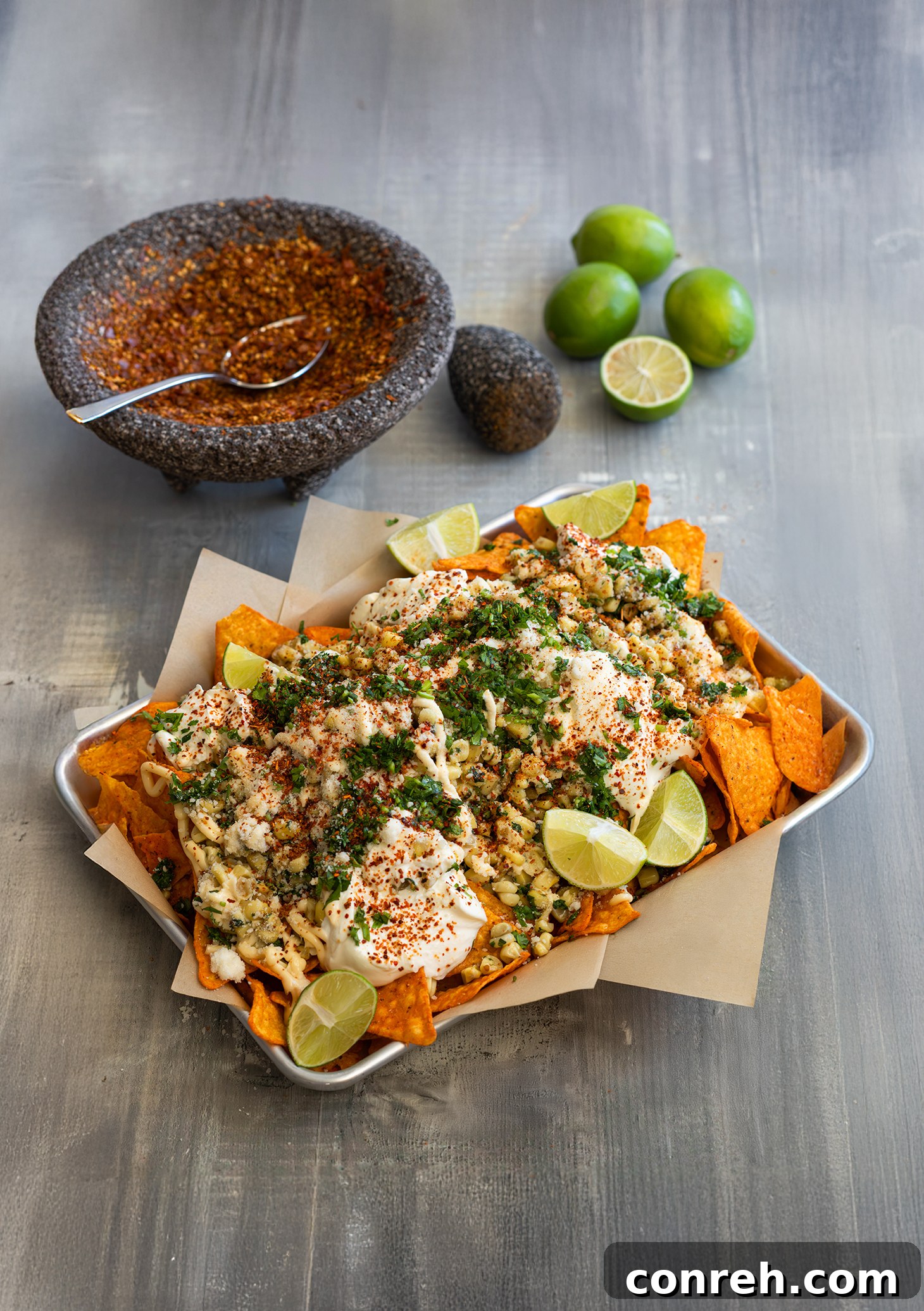Dori-Esquite, a bold and flavorful Mexican street food fusion, featuring corn salad and Doritos.