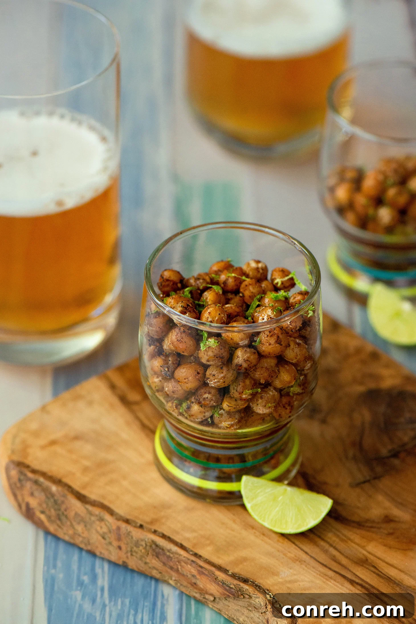 Spicy Garbanzo Beans: A vibrant bowl of garbanzo beans seasoned with spices and lime, perfect for snacking.