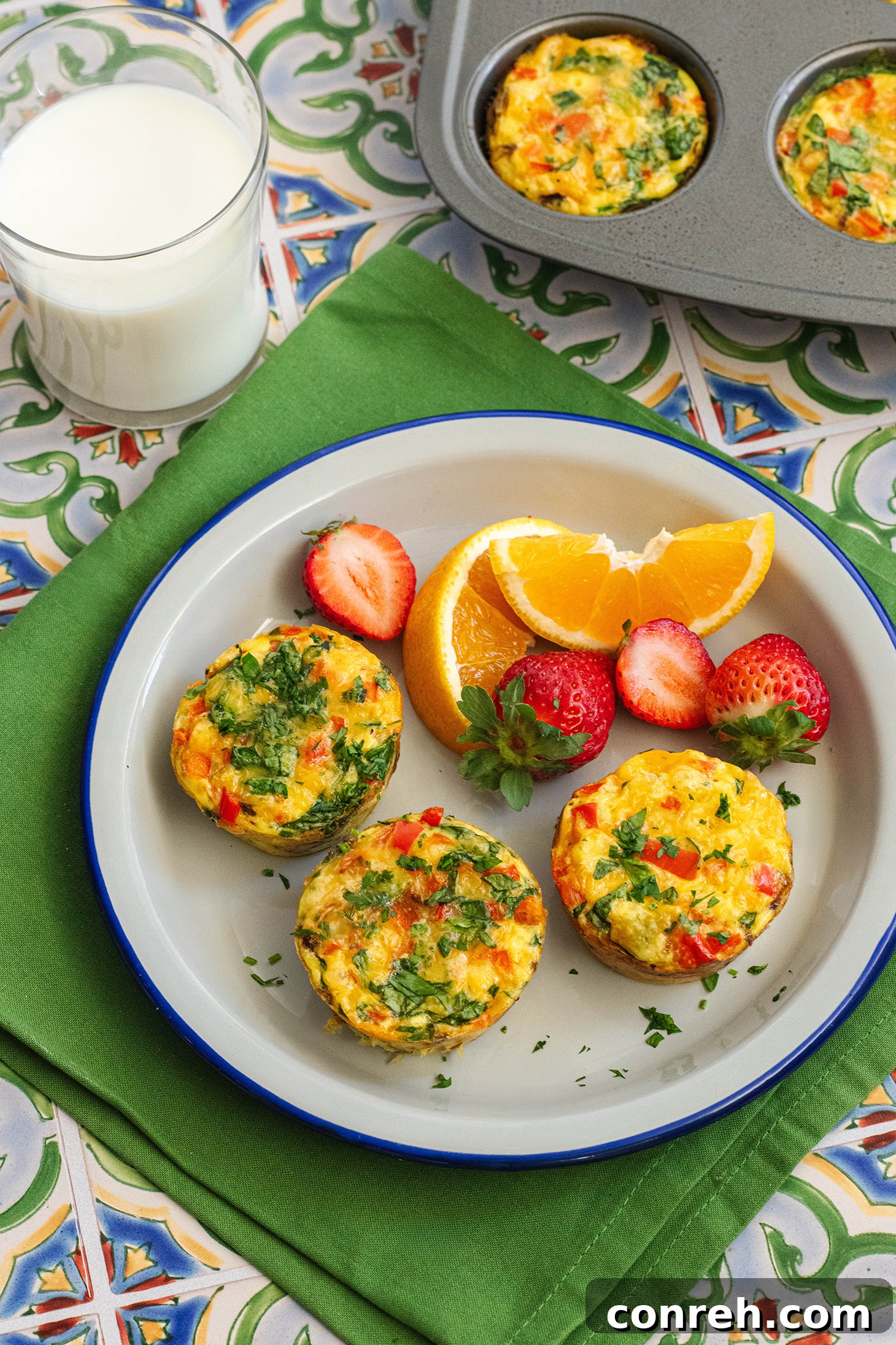 A close-up shot of a breakfast hashbrown nest being held, showing its crispy texture.