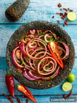 Pickled Red Onion and Chile Piquin in a jar