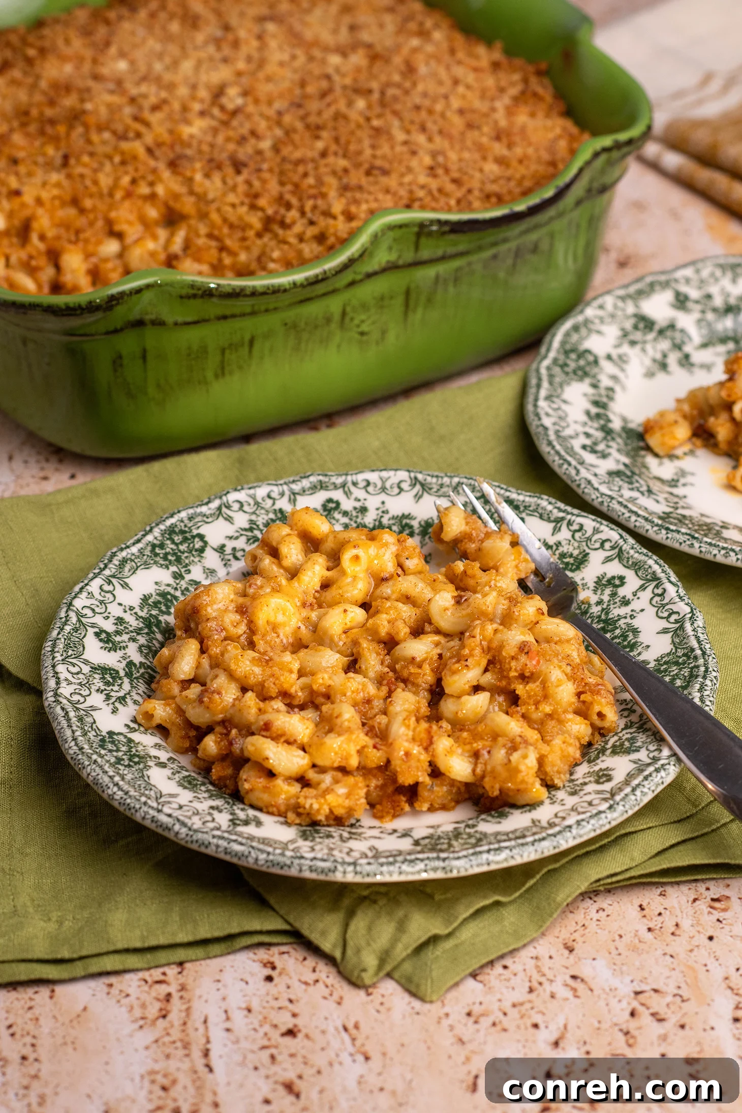 Mexican Mac and Cheese with Chorizo, rich and creamy with a golden crust, ready to be served at a holiday feast.