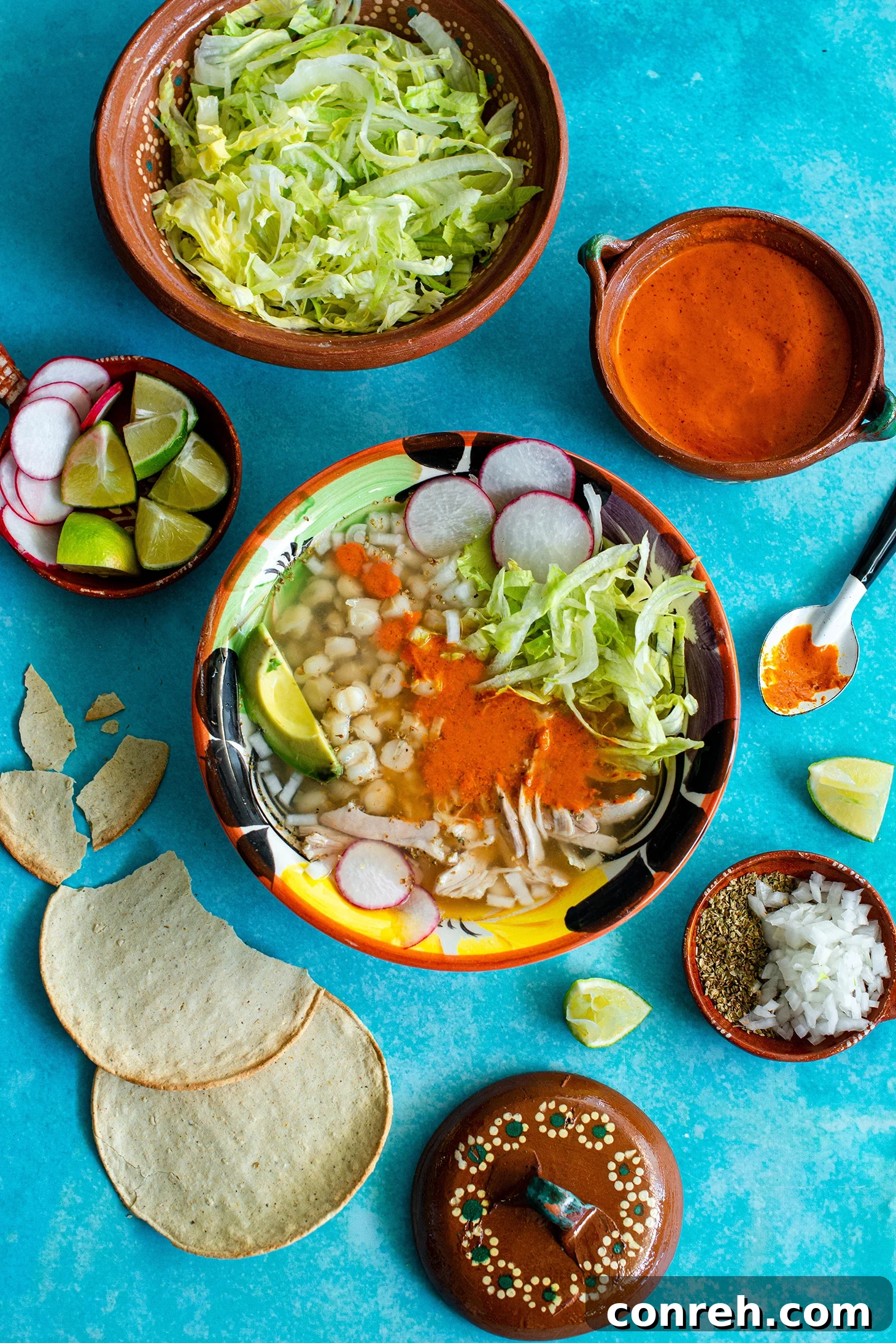Hearty White Chicken Pozole 2 A vibrant bowl of Chicken Pozole Blanco with fresh toppings, ready to be served on a cozy morning.