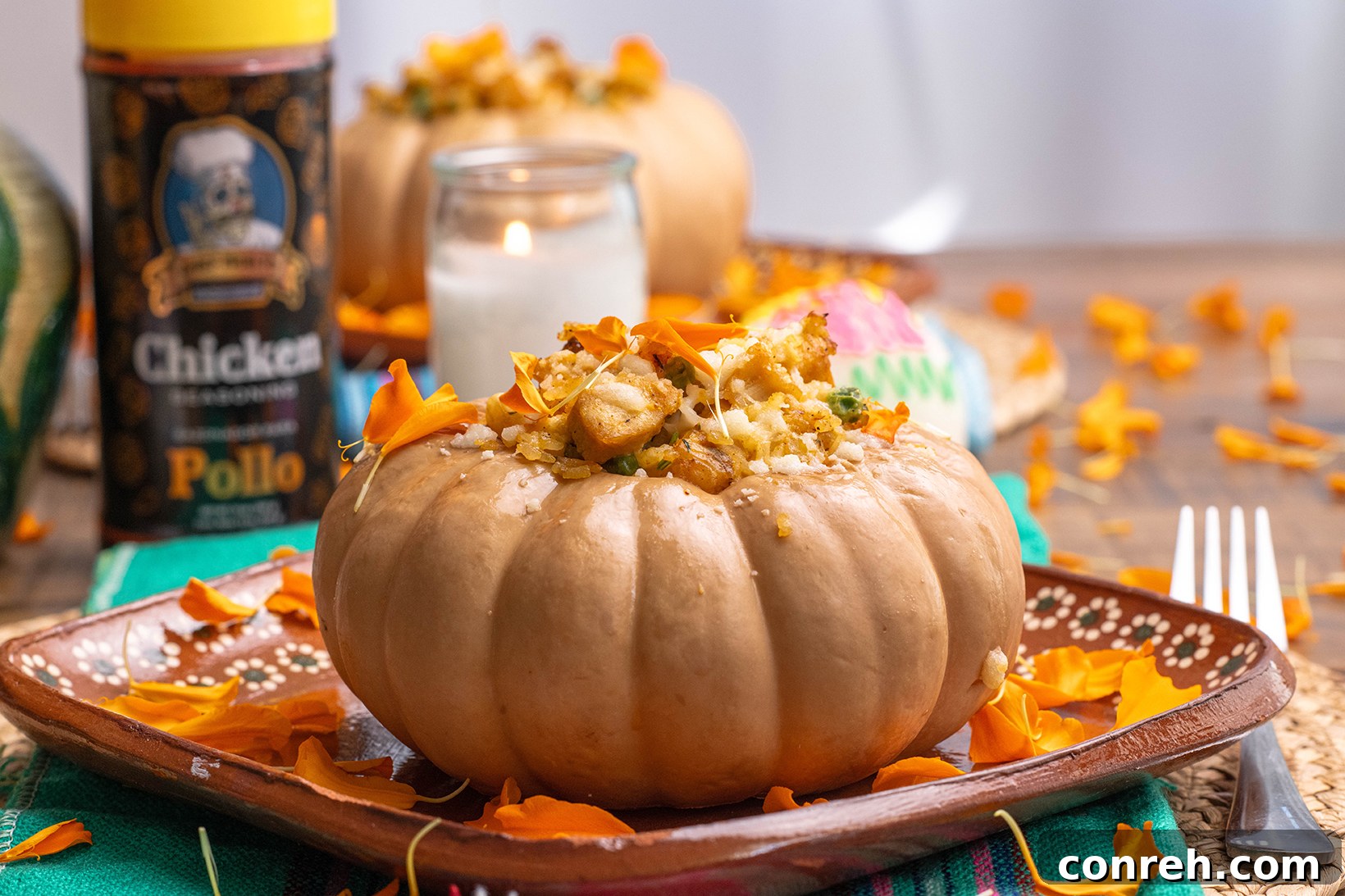 Close-up of Arroz con Pollo Roasted Pumpkins, showing the filling and garnishes.