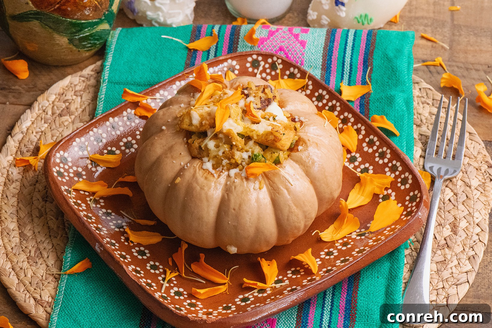 Several Arroz con Pollo Roasted Pumpkins arranged on a serving platter, ready to be enjoyed.